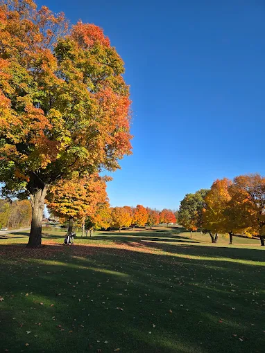 Brilliant fall colors framing the fairway